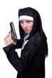 Nun with handgun isolated on white