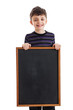 Photo: Nine year old boy holding a blank chalkboard Nine year old boy holding a blank chalkboard
