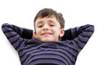 Photo: Nine year old boy relaxing isolated on white Nine year old boy relaxing isolated on white