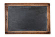 Photo: Blank vintage chalkboard isolated on white Blank vintage chalkboard isolated on white