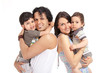 Photo: happy multiracial family of four studio portrait happy multiracial family of four studio portrait