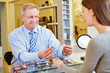 Foto: Consultation from optician for new glasses Consultation from optician for new glasses