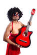Man in woman clothing with guitar