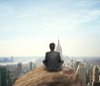 man looking at city