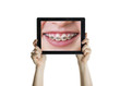 Foto: Dental closeup with tablet Dental closeup with tablet