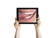 Foto: Dental closeup with tablet Dental closeup with tablet