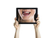 Foto: Dental closeup with tablet Dental closeup with tablet