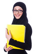 Young muslim woman with book on white