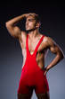 Young wrestler isolated on the white