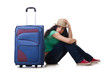 Young woman with suitcase isolated on white