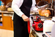 Butcher slicing ham