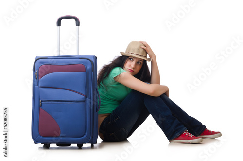 Photo: Young woman with suitcase isolated on white Young woman with suitcase isolated on white