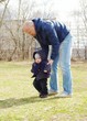 father learns his son to go outdoors in spring