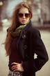 Photo: Stylish girl with long hair wearing sunglasses Stylish girl with long hair wearing sunglasses