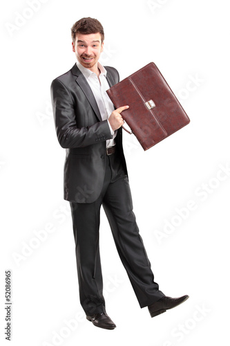 Photo: Businessman with briefcase standing on white background Businessman with briefcase standing on white background
