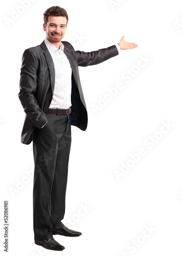 Photo: Happy business man presenting with copy space for your text Happy business man presenting with copy space for your text