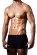 Muscular man isolated on the white