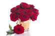 beautiful red roses in a wooden bucket