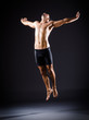 Dancer dancing in the dark studio