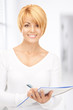 attractive businesswoman with notebook