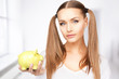lovely woman with piggy bank