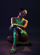Graceful model posing with UV pattern on body