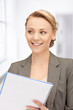 happy woman with big notepad