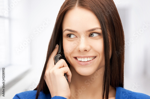Photo: businesswoman with cell phone businesswoman with cell phone