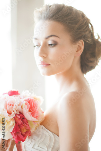 Photo: bride with bouquet of flowers bride with bouquet of flowers