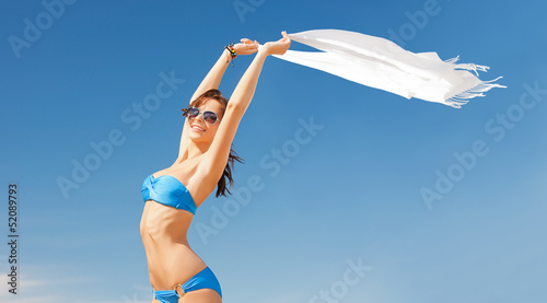 Photo: woman in bikini and sunglasses woman in bikini and sunglasses