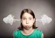 Foto: girl with smoke on her ears girl with smoke on her ears