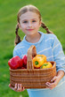Photo: Vegetable garden - lovely girl with basket of vegetables Vegetable garden - lovely girl with basket of vegetables
