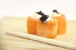Tasty rolls with salmon, cream cheese and caviar