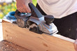 Carpenter with electric planes