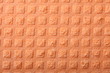 Orange sponge foam as background texture