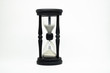Black hourglass isolated on white