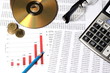 Photo: Financial or accounting concept - business chart, coin Financial or accounting concept - business chart, coin
