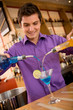 Barman making cocktail