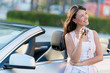 Happy woman holding car keys