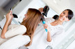 Foto: Hairdresser blowing woman's hair Hairdresser blowing woman's hair