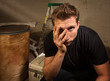 Unhappy Man Sitting