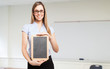 Woman holding a blackboard