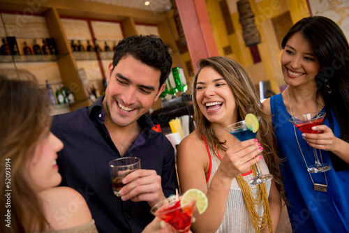 Photo: Group of friends at the bar Group of friends at the bar