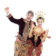 happy traditional java wedding couple