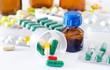 color pills and medical bottle