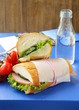 snack sandwiches (panini) with vegetables and ham