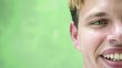 Happy young caucasian man looking at camera and smiling
