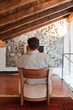 Photo: man watch a tv on a armchair man watch a tv on a armchair