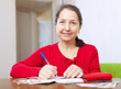  woman is calculated the family budget