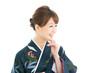 Beautiful japanese kimono woman isolated on white background
